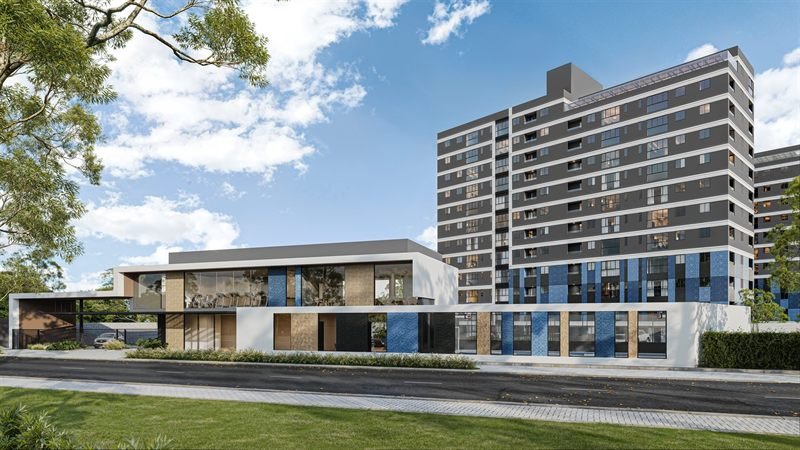 Imagem 3D da fachada de empreendimento residencial, com bloco de lazer no térreo e torre ao fundo