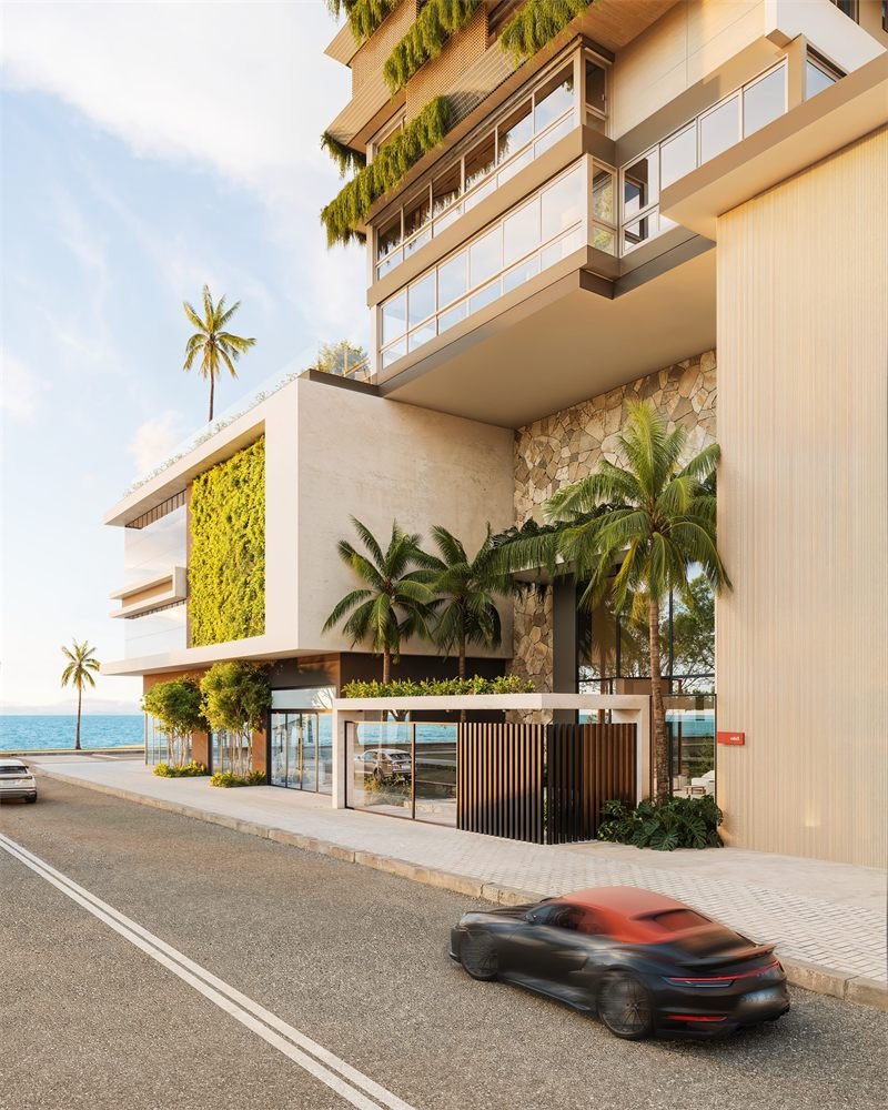 Renderização 3D do acesso ao edifício ao nível da rua, com parede de pedra, jardim vertical e coqueiros