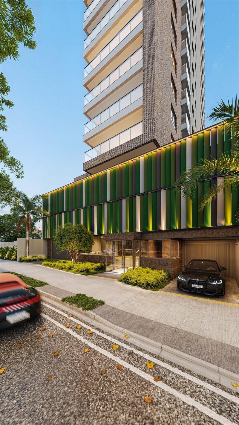 Renderização 3D do acesso ao edifício ao entardecer, com brises verdes iluminados, portaria envidraçada e garagem